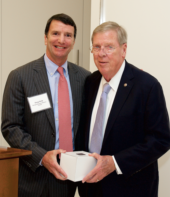 October 2015: Then-GRA Chair Doug Hertz (left) presents U.S. Sen. Johnny Isakson with the GRA Legacy Award.